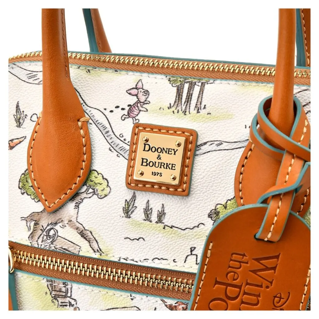 Winnie the Pooh and Friends 2022 Satchel (close up) by Dooney and Bourke