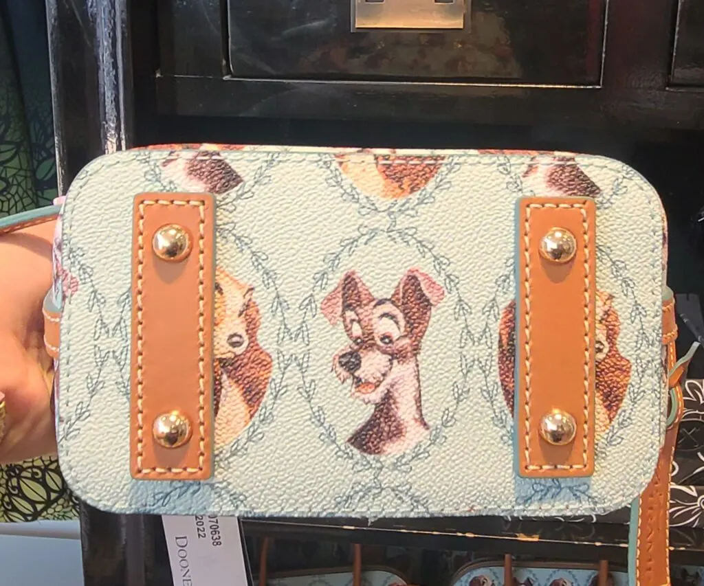 Lady and the Tramp Crossbody (bottom) by Dooney and Bourke at Downtown Disney