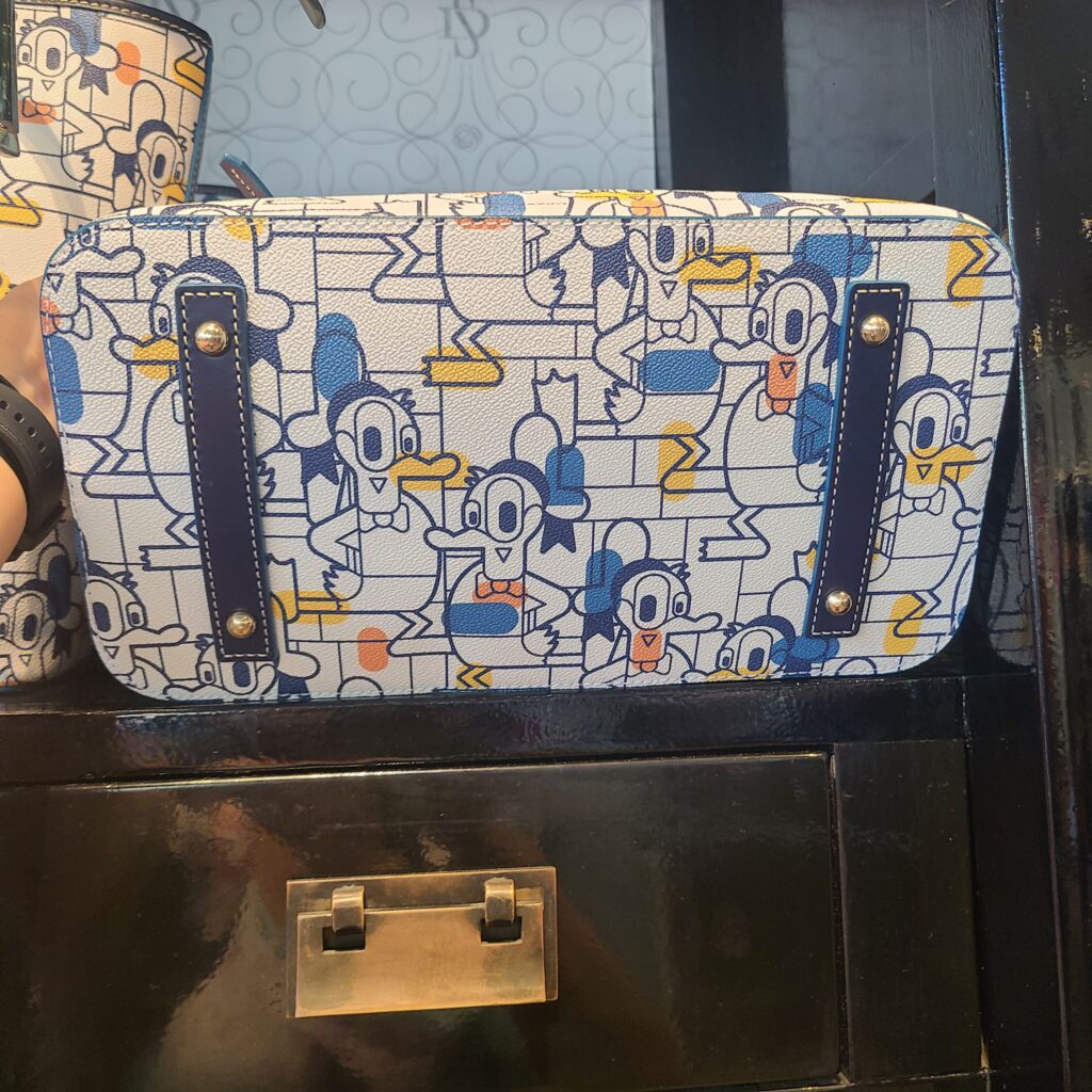 Donald Duck Satchel Bag (bottom) by Dooney & Bourke at Disneyland Resort