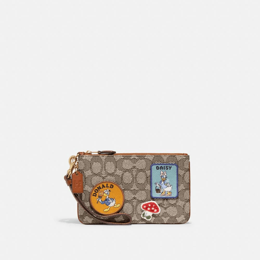 Disney X Coach Small Wristlet In Signature Textile Jacquard With Patches