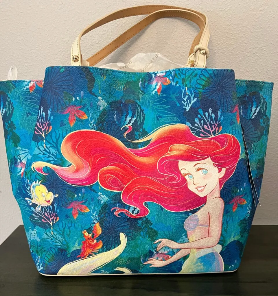 The Little Mermaid 2023 Tote (back) by Dooney and Bourke