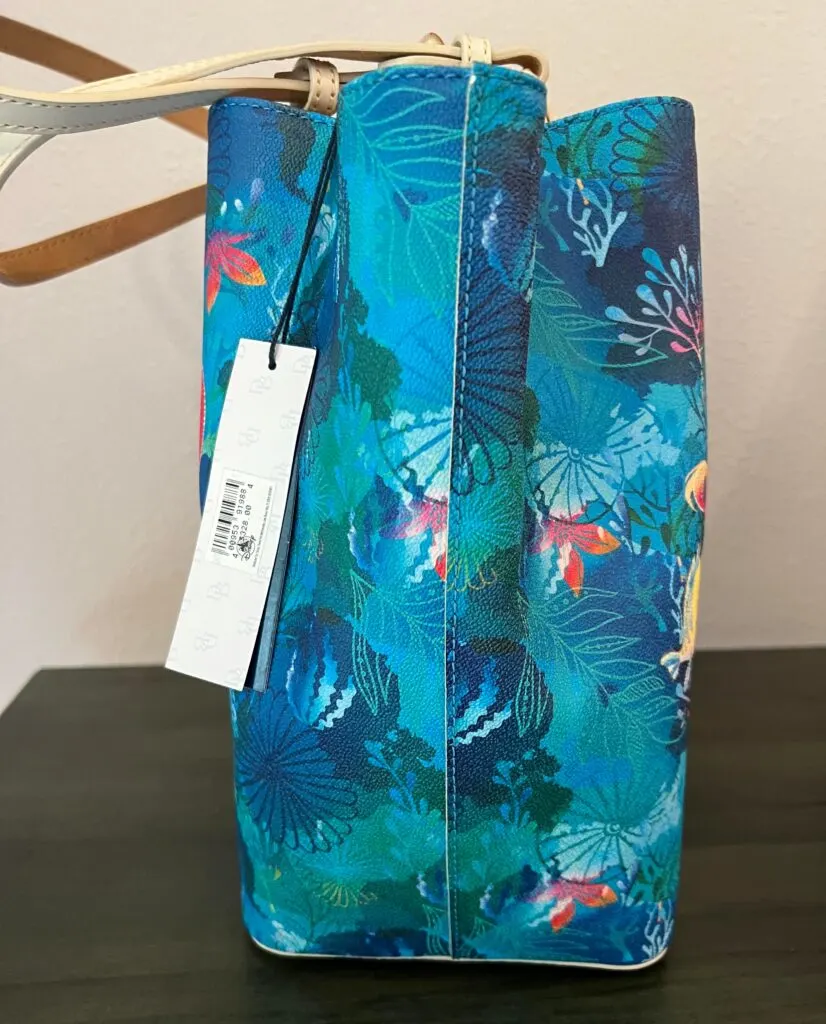 The Little Mermaid 2023 Tote (side) by Dooney and Bourke