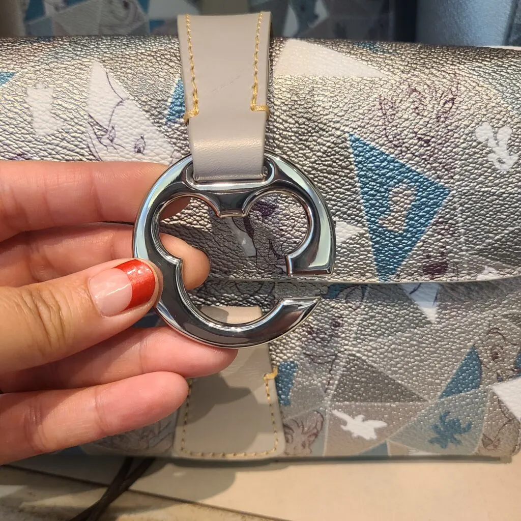 Disney100 Special Moments Crossbody Bag (closure) by Disney Dooney and Bourke
