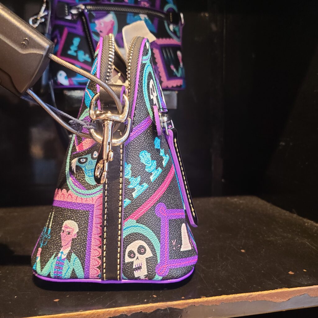 The Haunted Mansion 2023 Crossbody Bag (side) by Disney Dooney and Bourke