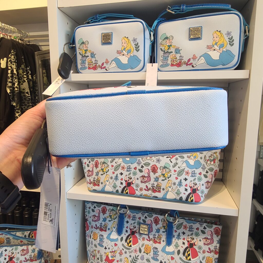 Alice in Wonderland Camera Bag (bottom) by Disney Dooney & Bourke