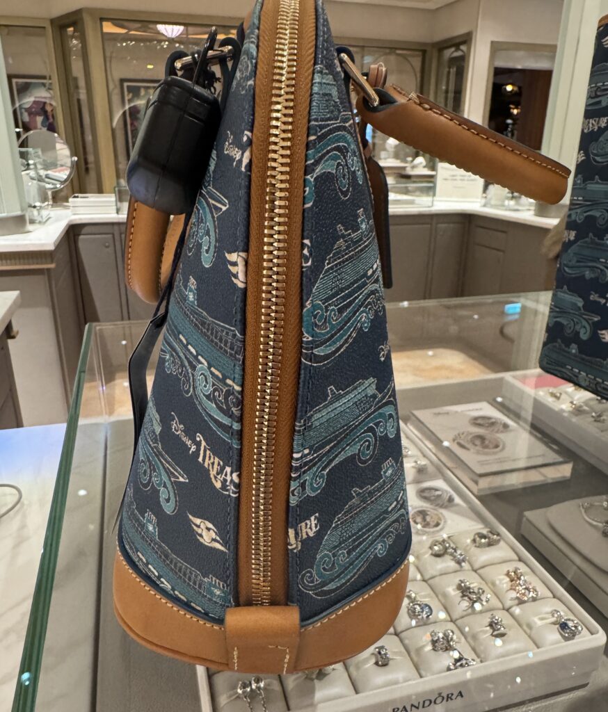 Disney Cruise Line Disney Treasure Inaugural 2024 Satchel (side) by Disney Dooney & Bourke Disney Cruise Line Disney Treasure Inaugural 2024 Satchel (side) by Disney Dooney & Bourke
