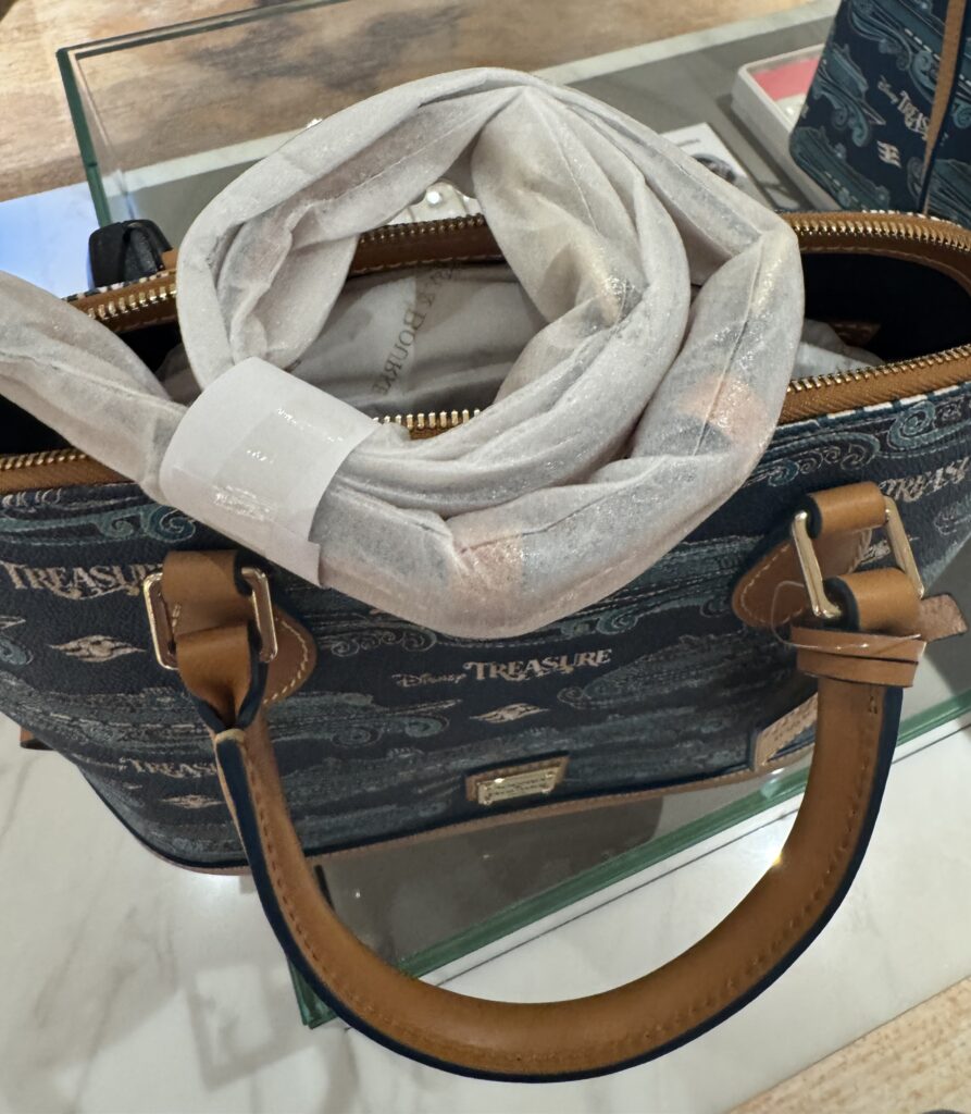Disney Cruise Line Disney Treasure Inaugural 2024 Satchel (strap) by Disney Dooney & Bourke Disney Cruise Line Disney Treasure Inaugural 2024 Satchel (strap) by Disney Dooney & Bourke