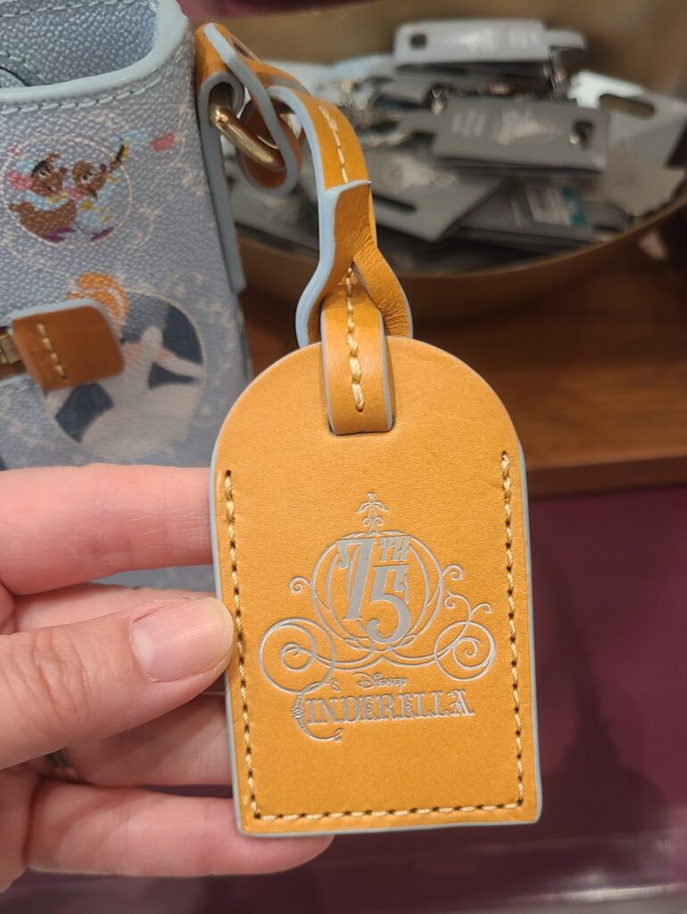 Cinderella 75th Anniversary Collection by Disney Dooney & Bourke (leather hangtag) Cinderella 75th Anniversary Collection by Disney Dooney & Bourke (leather hangtag)