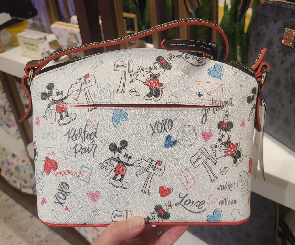 Mickey and Minnie Mouse Sweethearts Dooney & Bourke Crossbody Bag (back) Mickey and Minnie Mouse Sweethearts Dooney & Bourke Crossbody Bag (back)