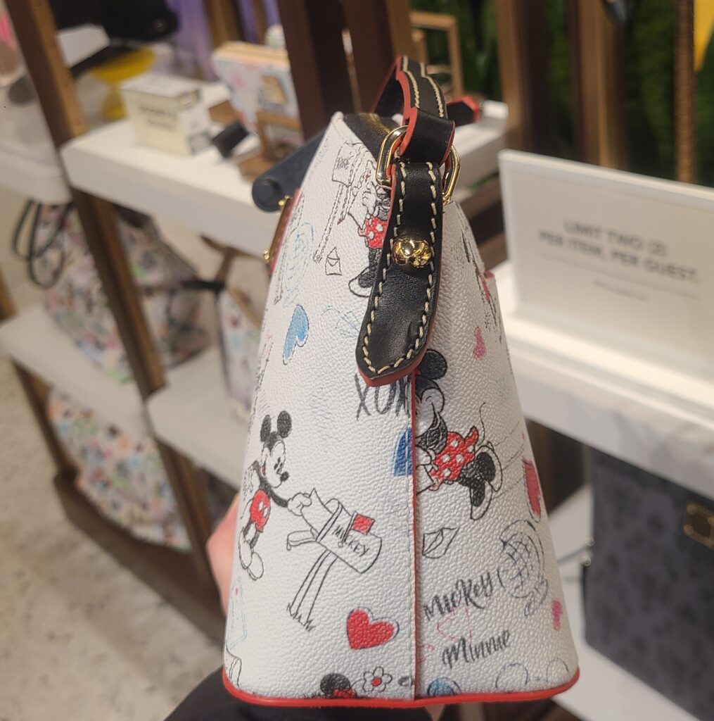 Mickey and Minnie Mouse Sweethearts Dooney & Bourke Crossbody Bag (side) Mickey and Minnie Mouse Sweethearts Dooney & Bourke Crossbody Bag (side)