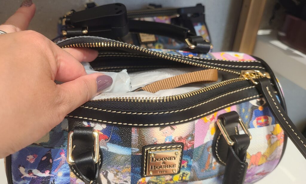 Disney Classic Films Barrel Satchel (interior) by Disney Dooney and Bourke Disney Classic Films Barrel Satchel (interior) by Disney Dooney and Bourke
