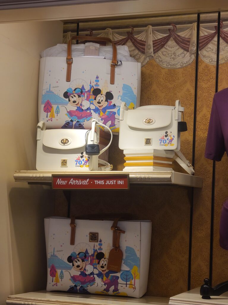 Disneyland 70th Anniversary Collection by Disney Dooney & Bourke Disneyland 70th Anniversary Collection by Disney Dooney & Bourke