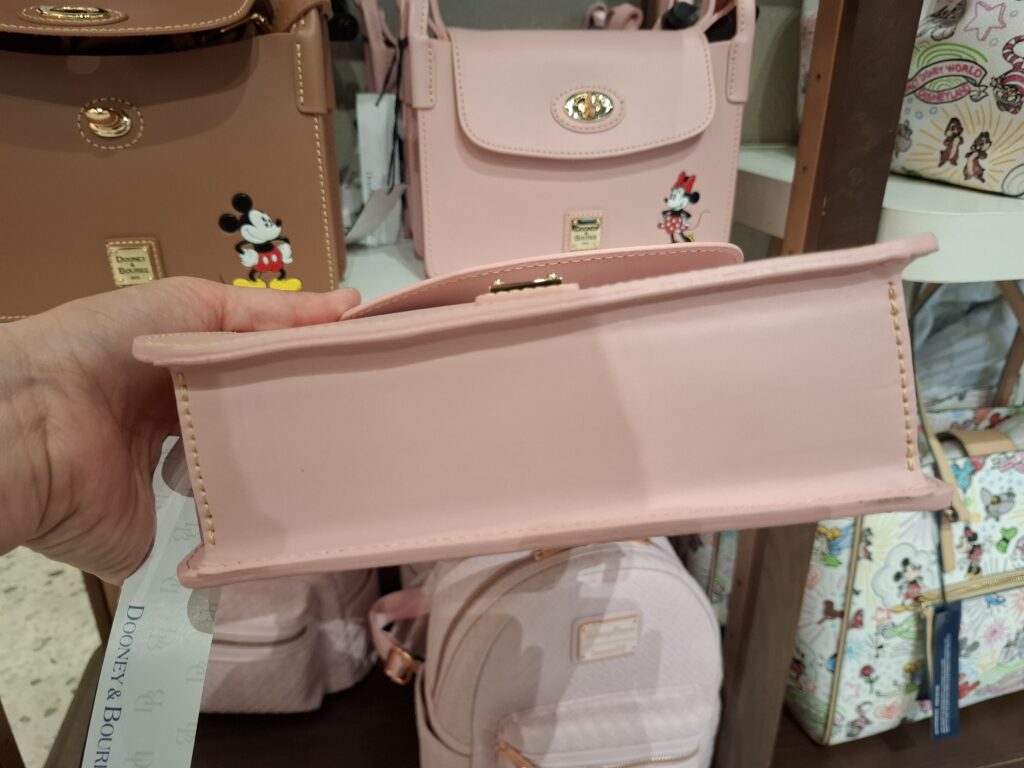 Minnie Pinky Crossbody Bag by Disney Dooney & Bourke (bottom)