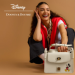 Mickey White Pinky Crossbody Bag by Disney Dooney & Bourke