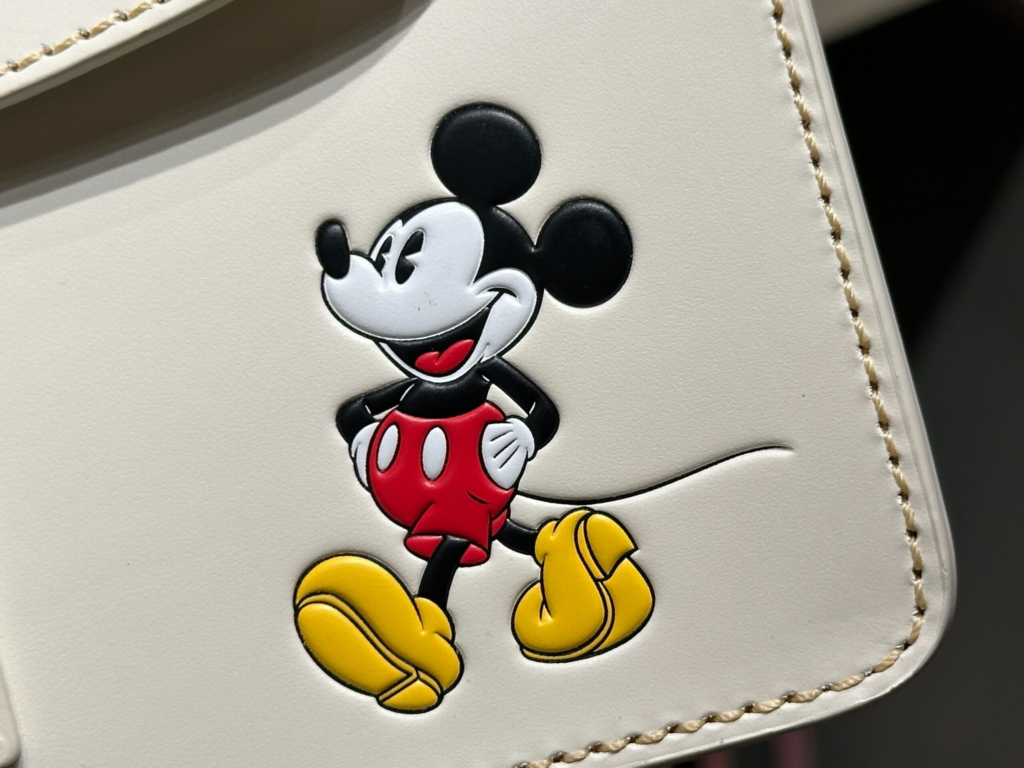Mickey Mouse White Pinky Leather Crossbody Bag by Disney Dooney & Bourke (close-up)
