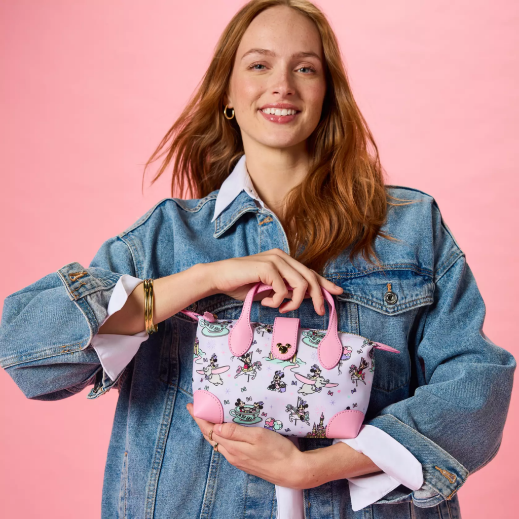 Mickey and Minnie Mouse in the Parks Mini Pouchette Bag by Stoney Clover Lane (model)