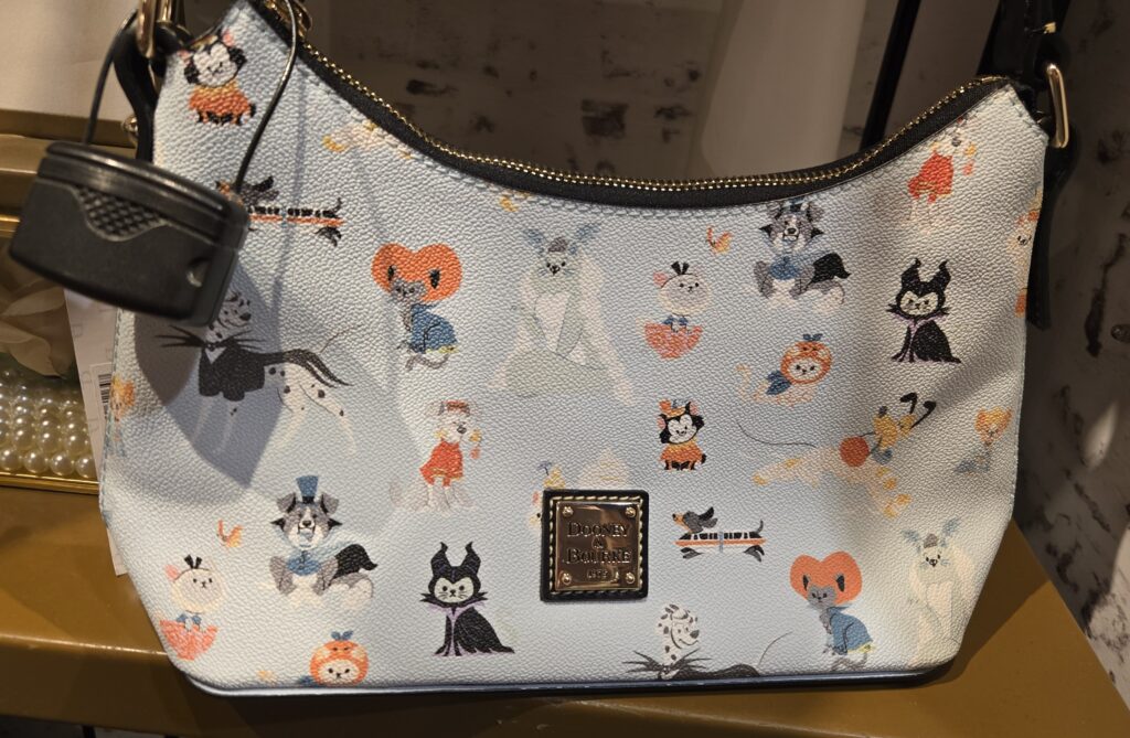 Halloween Cats and Dogs Baguette Bag by Disney Dooney & Bourke (close-up) Halloween Cats and Dogs Baguette Bag by Disney Dooney & Bourke (close-up)