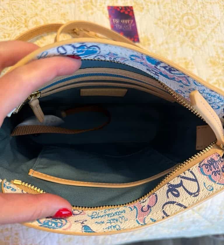 Beauty and the Beast Musical Crossbody Bag by Disney Dooney & Bourke (interior) Beauty and the Beast Musical Crossbody Bag by Disney Dooney & Bourke (interior)
